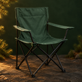 Forest-green folding camping chair in green-and-gold theme setting